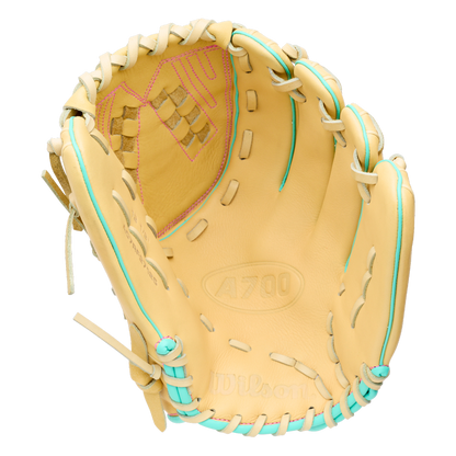 Wilson A700 12.5″ Fastpitch Glove: WBG05001RT125 crafted from tan full grain leather, featuring teal lacing and pink stitching.