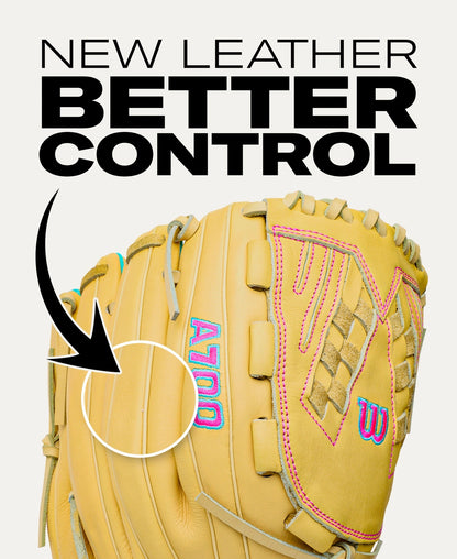 Tan Wilson A700 12.5″ Fastpitch Glove: WBG05001RT125 with neon pink and blue stitching, featuring an arrow pointing to the leather palm and text reading: NEW LEATHER BETTER CONTROL.