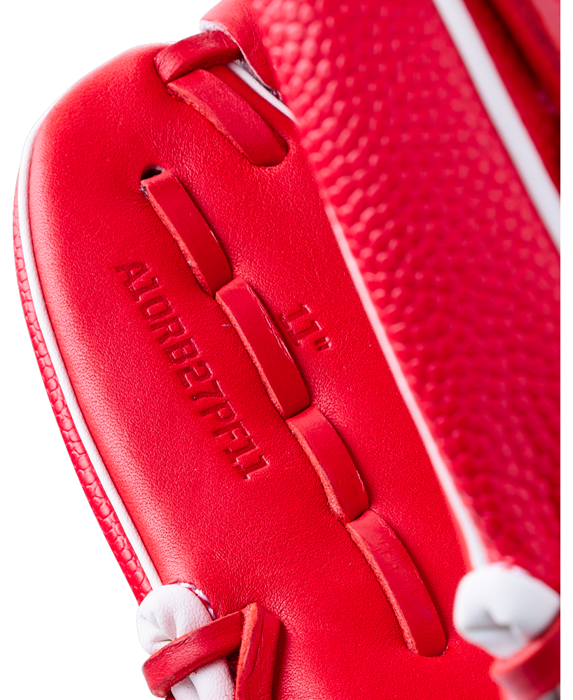 Close-up of a red Wilson A1000 PF11SS 11″ Baseball Glove showing the text A10RB27PF11 and 11 embossed on the palm.