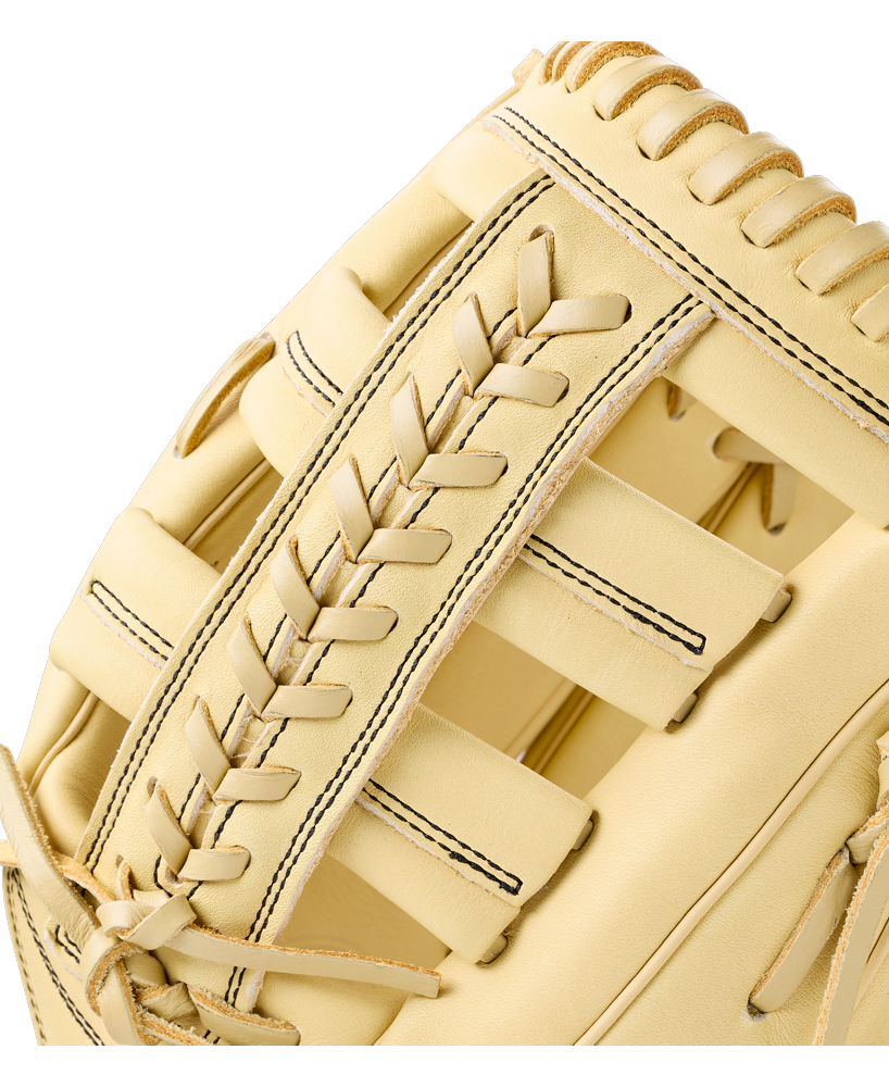 Close-up of a light-colored Wilson A1000 1892 12.25″ Baseball Glove: WBG05301RT1225 showing the web lacing and finger stalls.