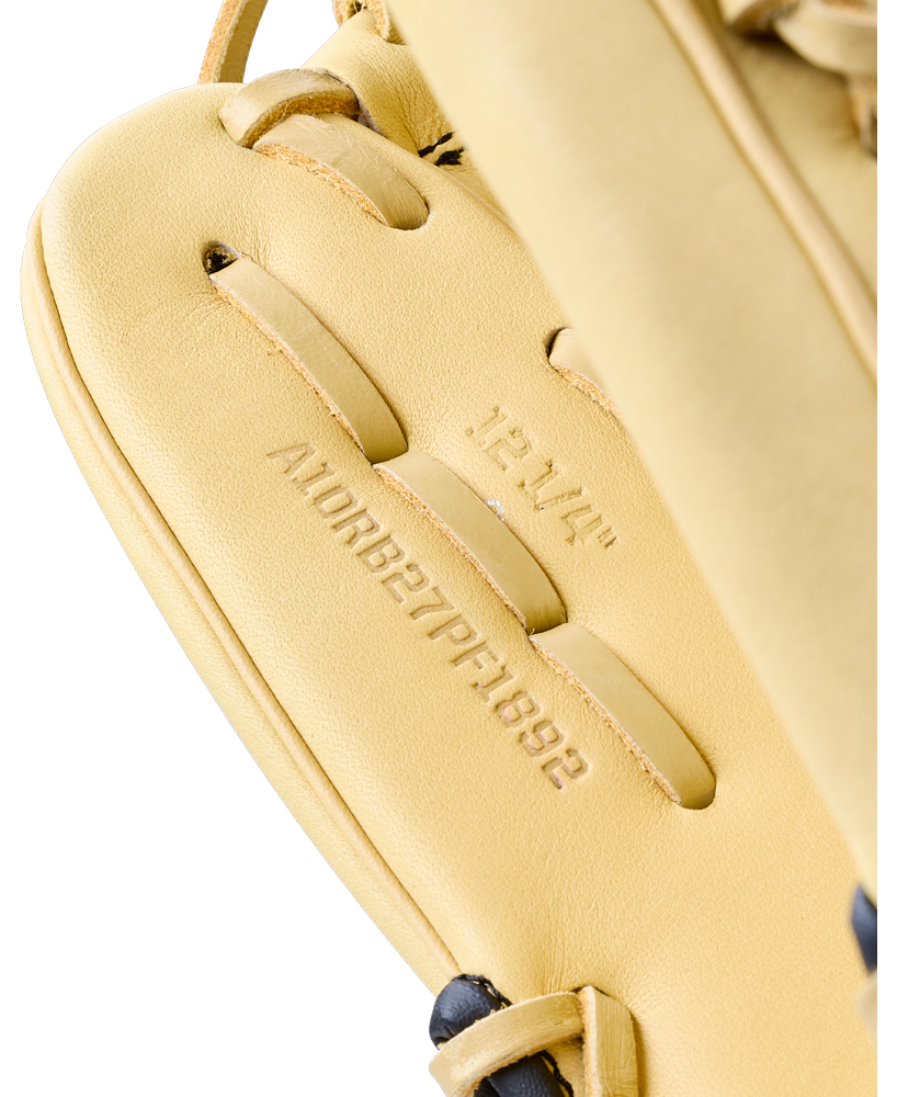 Close-up of a Wilson A1000 1892 12.25″ Baseball Glove: WBG05301RT1225 showing the size 12 1/4 and model number stamped on the leather.