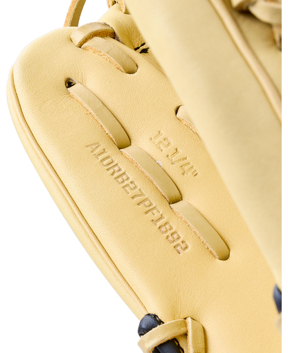 Close-up of a Wilson A1000 1892 12.25″ Baseball Glove: WBG05301RT1225 showing the size 12 1/4 and model number stamped on the leather.