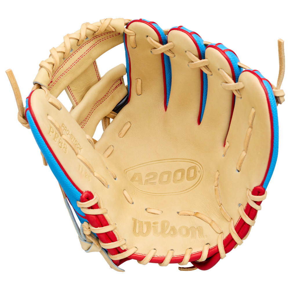 A tan Wilson A2000 PF88SS 11.25″ Baseball Glove (WBG05402RT1125) with red and blue laces, open to display the inside palm area featuring embossed A2000 and Wilson branding in the leather. Designed with Pedroia Fit Technology, this glove offers a snug, comfortable fit ideal for quick plays on the diamond.