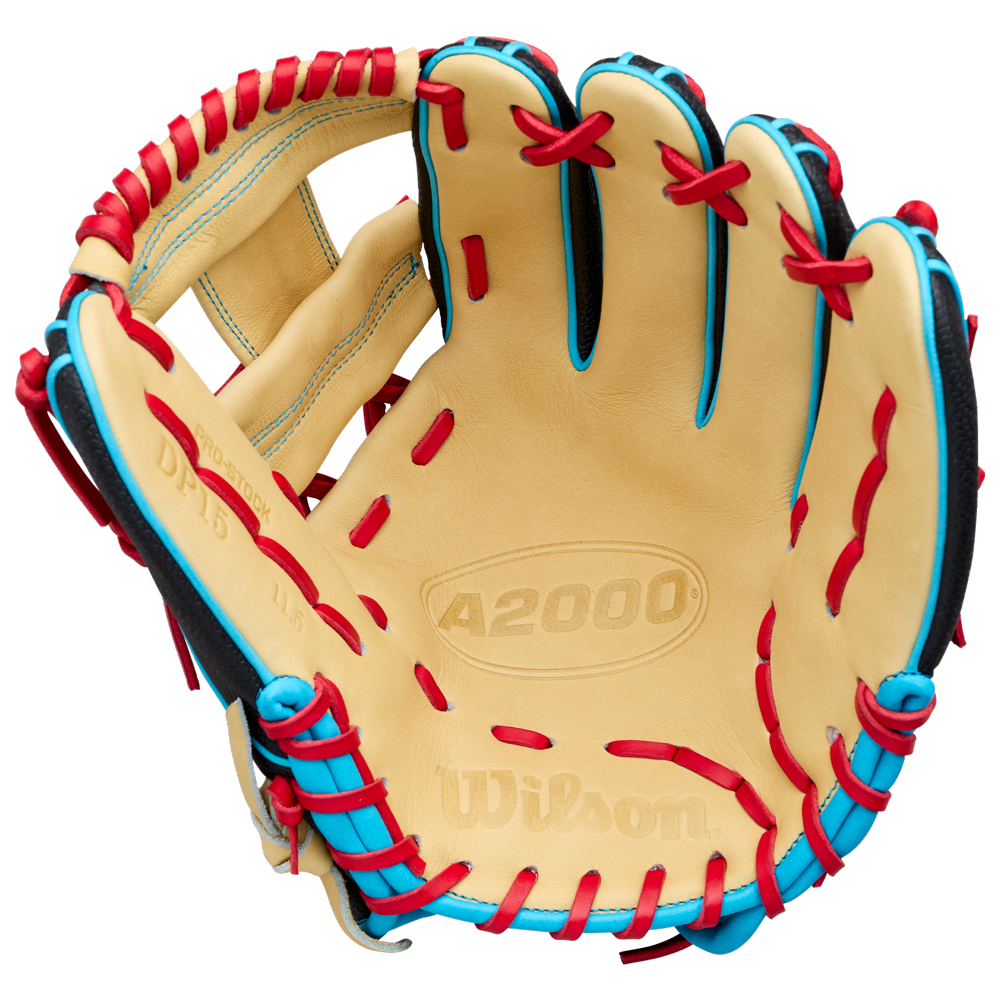 A Wilson A2000 DP15SS 11.5″ Baseball Glove (WBG05501RT115) by Wilson, featuring a tan leather design with red laces and blue trim, includes the signature Pedroia Fit and highlights the inside palm and webbing details.