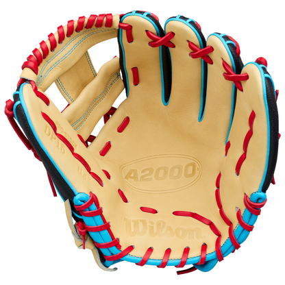 A Wilson A2000 DP15SS 11.5″ Baseball Glove (WBG05501RT115) by Wilson, featuring a tan leather design with red laces and blue trim, includes the signature Pedroia Fit and highlights the inside palm and webbing details.