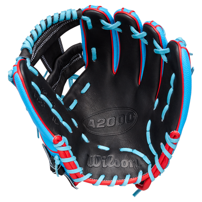 A black Wilson baseball glove with red trim and bright blue laces, open and facing upward, displaying the A2000 and Wilson branding on the palm.