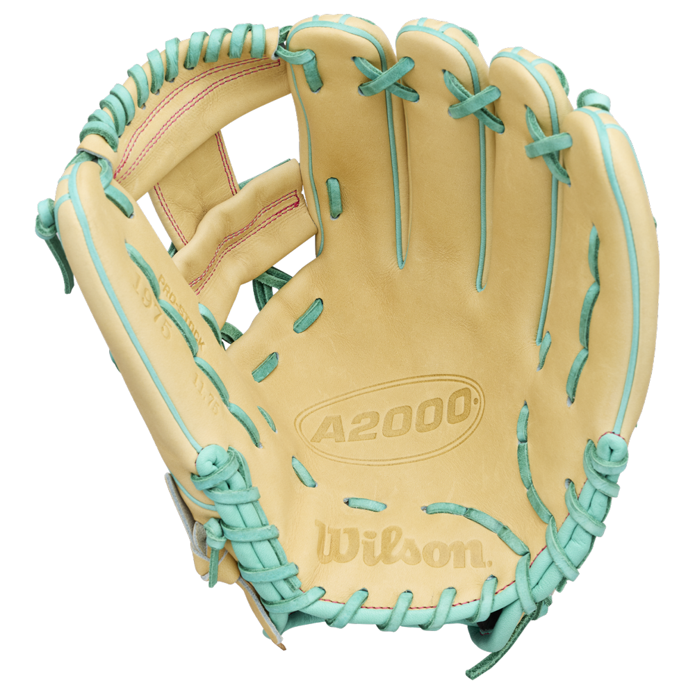 A tan Wilson A2000 1975 baseball glove with teal laces and A2000 embossed on the palm, featuring an extra deep pocket, displayed open with visible stitching.