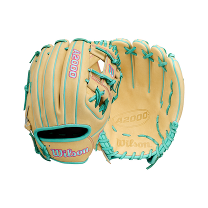 Two tan Wilson A2000 1975 11.75″ Baseball Gloves (model WBG05701RT1175) are displayed, each featuring turquoise laces and pink accents. One glove is shown palm up, while the other reveals the back with visible stitching and Wilson branding. These infield gloves by Wilson are designed with an extra deep pocket for more secure catches.