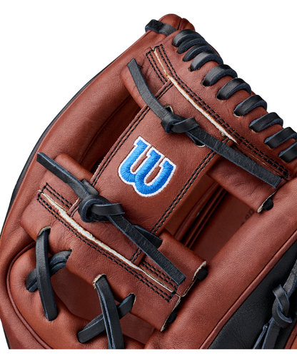Close-up of a Wilson A2000 BWJ7GM 11.75″ Bobby Witt Jr. GM Baseball Glove (WBG05801RT1175) in brown leather with black laces and a blue Wilson “W” logo stitched on the inner palm, echoing the distinctive Bobby Witt Jr. glove style.