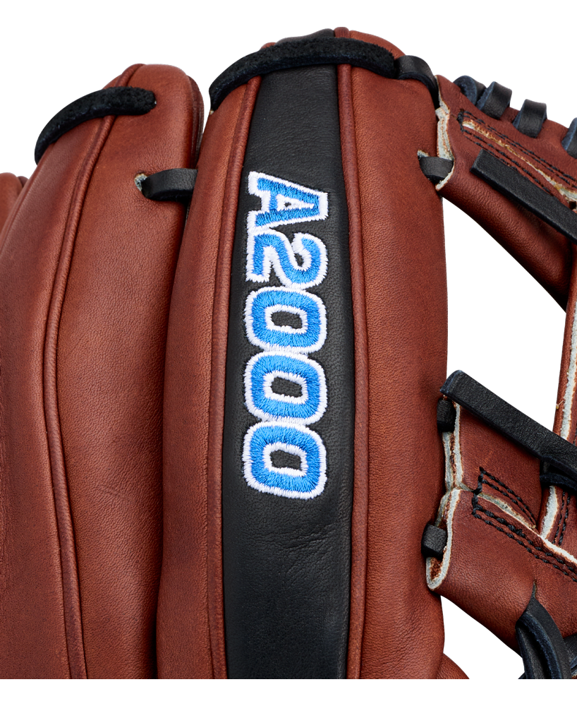 Close-up of the Wilson A2000 BWJ7GM 11.75″ Bobby Witt Jr. GM Baseball Glove (WBG05801RT1175), featuring rich brown leather, black trim, and white-blue “A2000” embroidery on one of its fingers—a design inspired by the model used by Bobby Witt Jr.