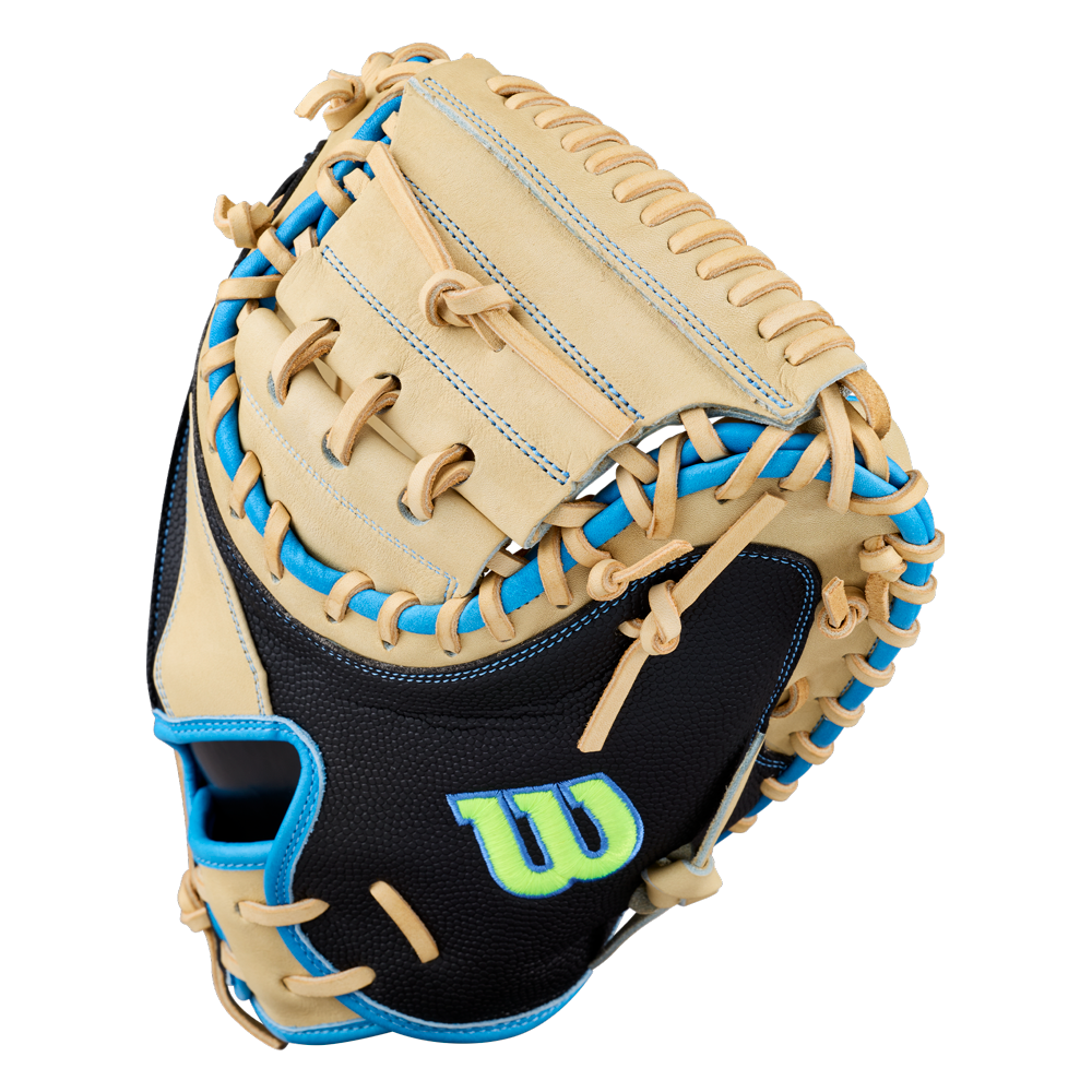 Introducing the Wilson A2000 M23SS 33.5″ Baseball Catcher’s Mitt (WBG06201RT335) by Wilson—a tan and black ultra-light catcher’s mitt with blue stitching and trim, featuring a prominent W logo on the palm and tan laces throughout, expertly designed to enhance pitch-framing performance.