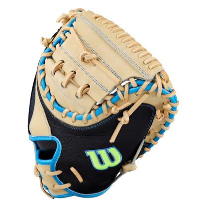 Introducing the Wilson A2000 M23SS 33.5″ Baseball Catcher’s Mitt (WBG06201RT335) by Wilson—a tan and black ultra-light catcher’s mitt with blue stitching and trim, featuring a prominent W logo on the palm and tan laces throughout, expertly designed to enhance pitch-framing performance.
