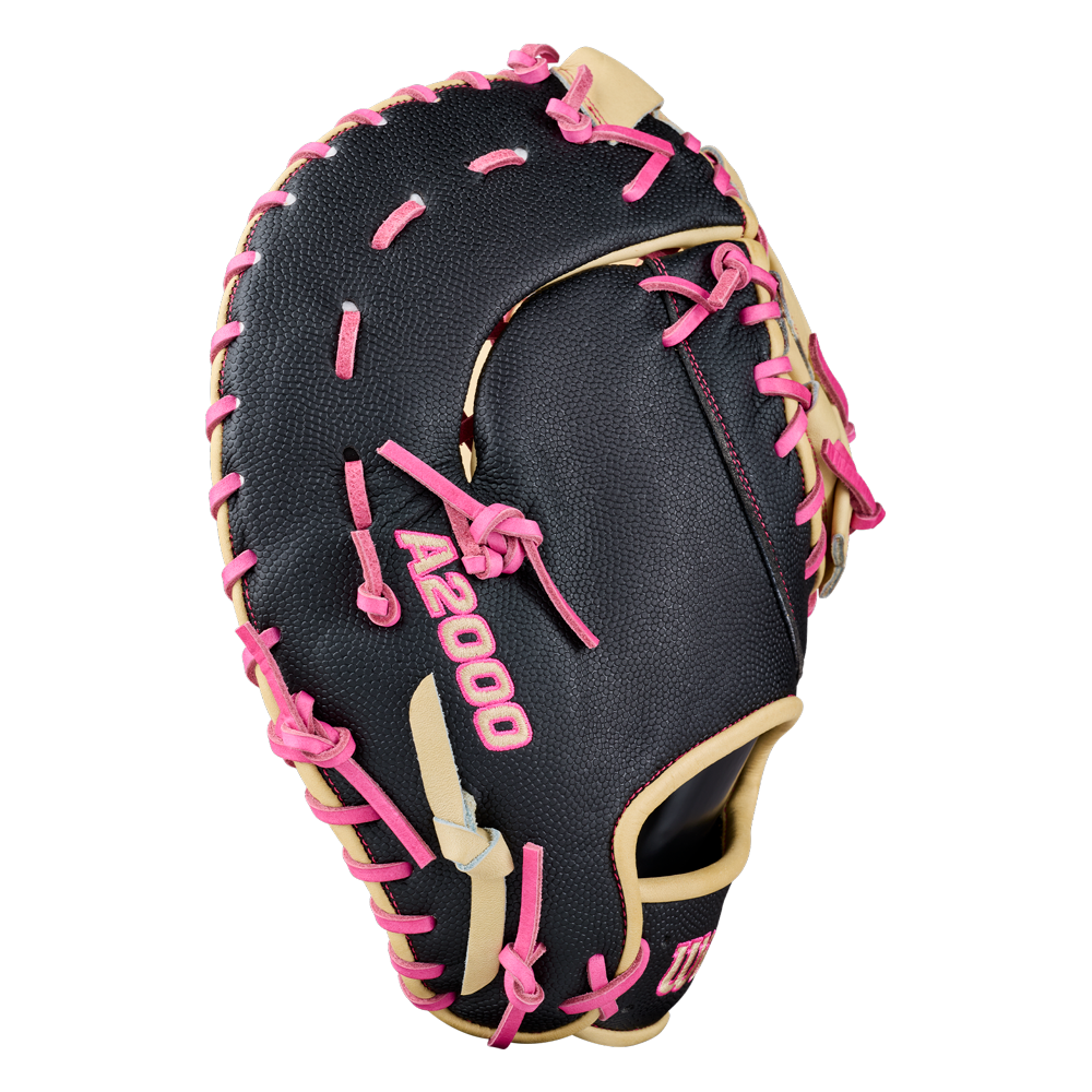 A black Wilson A2000 1673SS 13″ Baseball First Base Mitt (WBG06301RT13) featuring pink laces and “A2000” in pink on the glove. Crafted for performance and style, this Wilson mitt is perfect for players seeking a standout design.