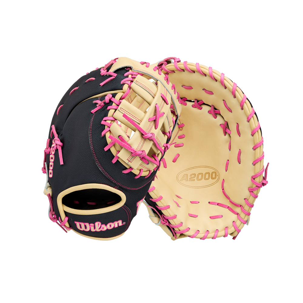 Showcasing two Wilson A2000 1673SS 13″ Baseball First Base Mitts (WBG06301RT13) by Wilson, these gloves feature striking black and tan leather with pink laces. One mitt displays the palm side, while the other highlights the back and iconic Wilson branding—an ideal choice for any player looking for a premium, stylish first base glove.