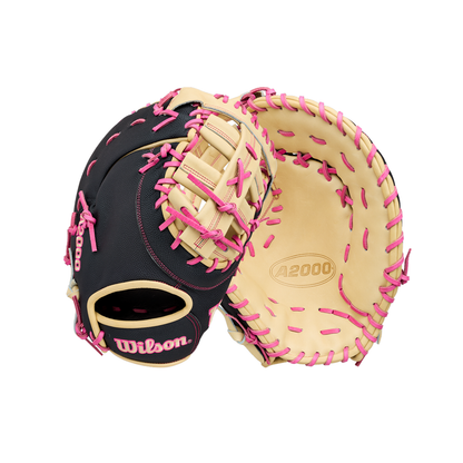 Showcasing two Wilson A2000 1673SS 13″ Baseball First Base Mitts (WBG06301RT13) by Wilson, these gloves feature striking black and tan leather with pink laces. One mitt displays the palm side, while the other highlights the back and iconic Wilson branding—an ideal choice for any player looking for a premium, stylish first base glove.