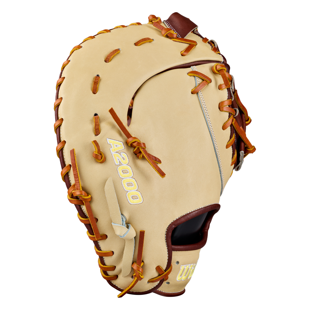 A tan and brown 13-inch first base mitt crafted from premium Pro Stock leather, the Wilson A2000 1673 features sturdy leather lacing, an open pocket for exceptional performance, and A2000 embroidered on the side.