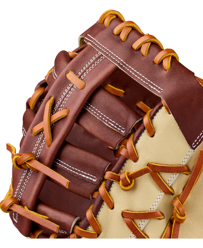 Close-up of a Wilson A2000 1673 13″ Baseball First Base Mitt (WBG06401RT13) in brown and tan Pro Stock leather, highlighting the detailed stitching and laces against a white background.