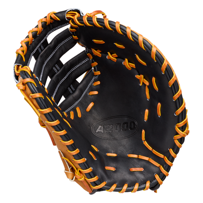A Wilson A2000 1677 12.5″ First Base Mitt (model WBG06501RT125) in black and brown Pro Stock leather with tan laces, open and palm facing upward.