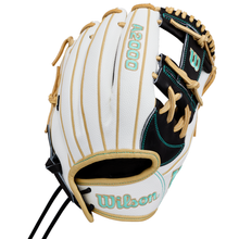 A Wilson A2000 H12SS 12″ Fastpitch Glove (WBG06701RT12) by Wilson, featuring a white and tan design with teal accents and black lacing, is photographed against a white background.
