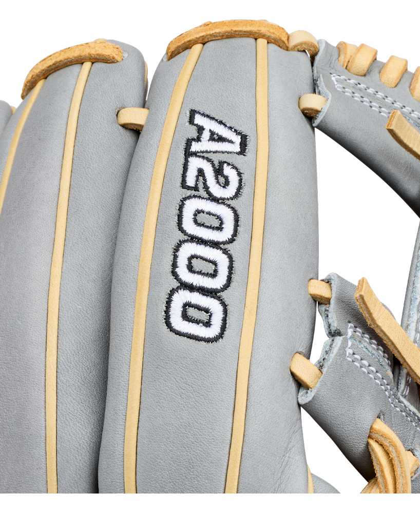 Close-up of a gray Wilson A2000 H12 12″ Fastpitch Glove (model WBG06801RT12) featuring tan laces and white stitching. The text “A2000 H12” is embroidered in white and black on one of the fingers, highlighting this premium Wilson infield glove.
