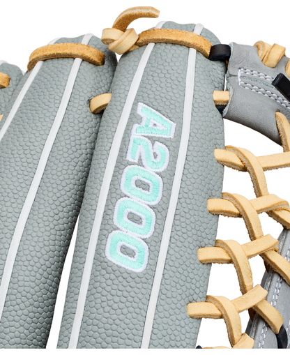 Close-up of a grey textured Wilson A2000 T125SS 12.5″ Fastpitch Glove with “A2000” embroidered in light blue and white on one of the fingers; tan and white laces are visible on this premium glove by Wilson.