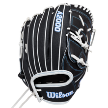 The Wilson A2000 FPB25SS 12.25″ Fastpitch Glove (WBG07201RT1225) by Wilson is displayed against a white background, featuring a black design with white laces and blue stitching.