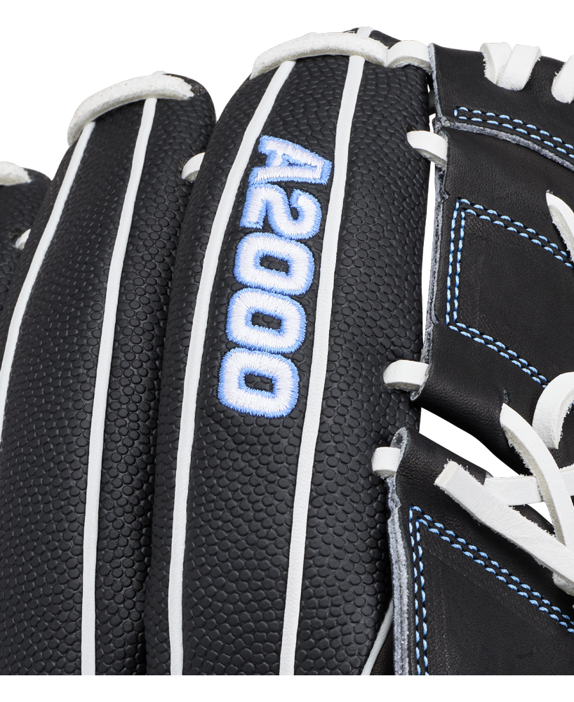 Close-up of the Wilson A2000 FPB25SS 12.25″ Fastpitch Glove, featuring a black design with white laces and blue stitching. The glove displays the “A2000” logo embroidered in blue and white on one finger, highlighting this premium Wilson fastpitch pitcher’s glove.