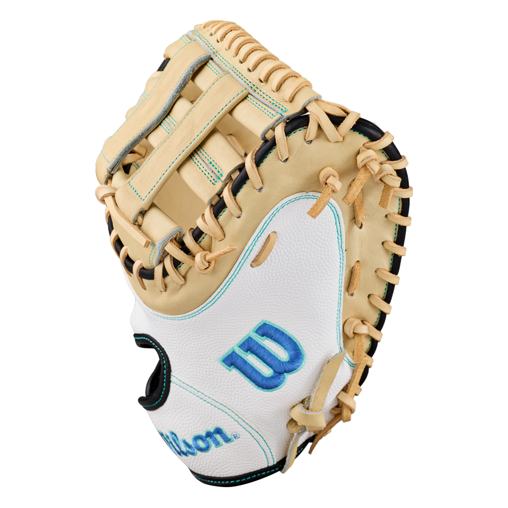 The Wilson A2000 FPCM23SS 34″ Fastpitch Catcher’s Mitt (WBG07301RT34) showcases a beige and white design with black laces, teal stitching, and a blue W logo on the palm. Featuring a Dual Post Web, this lightweight Wilson glove is displayed against a white background.