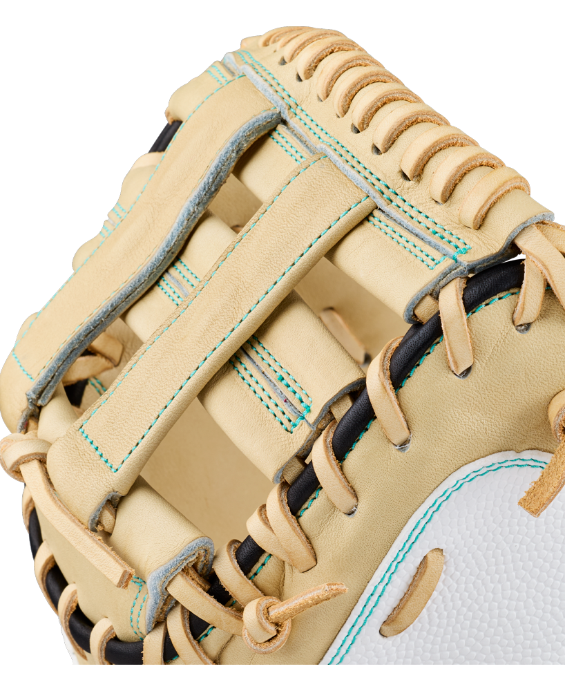 Close-up of the Wilson A2000 FPCM23SS 34″ Fastpitch Catcher’s Mitt displaying intricate stitching, black laces, and a Dual Post Web design in beige and white. The premium leather craftsmanship from Wilson is clearly visible in the detailed texture.