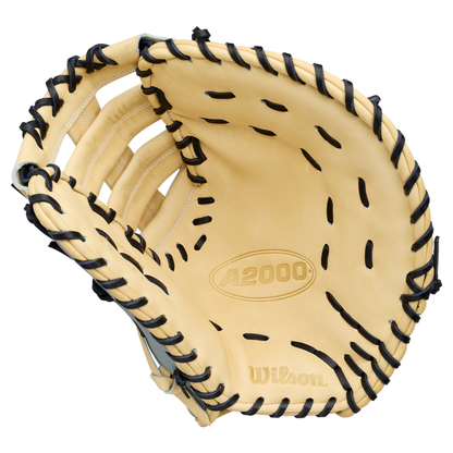 The Wilson A2000 FP1620SS 12.5″ Fastpitch First Base Mitt (WBG07401RT125) features an open tan design with black lacing, shown from above to highlight the pocket and interior details, and is expertly crafted from premium Pro Stock leather for dependable performance on the field.