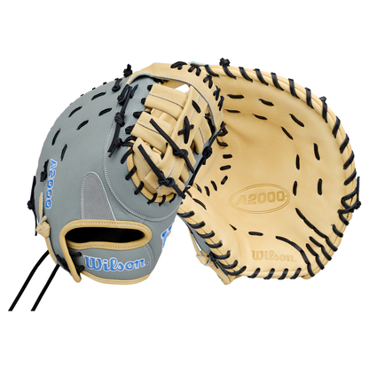 Two Wilson A2000 baseball gloves, crafted with Pro Stock leather for premium durability, one showing the outside with Wilson branding and grey, tan, and black details, and the other showing the tan inside with black stitching and A2000 and Wilson logos visible. This 12.5” glove is ideal as a fastpitch first base mitt for serious players seeking exceptional performance.