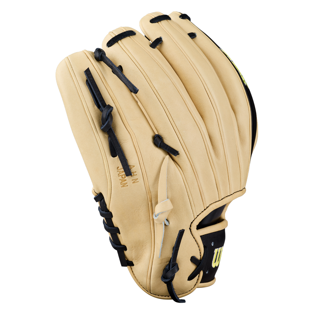 A Wilson A2K 1786 11.5″ Baseball Glove (model WBG07601RT115) in tan leather with black laces is displayed against a white background, palm side down and fingers pointing upward.