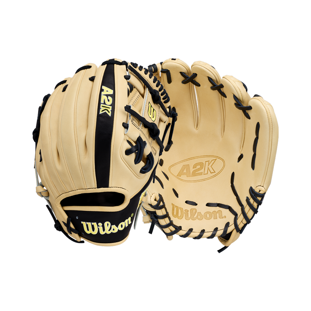 Two tan Wilson A2K 1786 11.5″ Baseball Gloves (WBG07601RT115) with black lacing are shown—one displays the front palm side while the other reveals the back, featuring the distinctive Wilson brand name and logo. Each glove is expertly crafted to deliver exceptional quality and performance, living up to the high standards of a handmade Japanese baseball glove.
