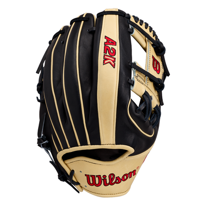 A Wilson A2K 1724 11.75″ Baseball Glove (WBG07701RT1175) in black and tan, featuring Double Palm Construction, with “A2K” and “Wilson” embroidered in red on the glove. The palm side is shown facing away.