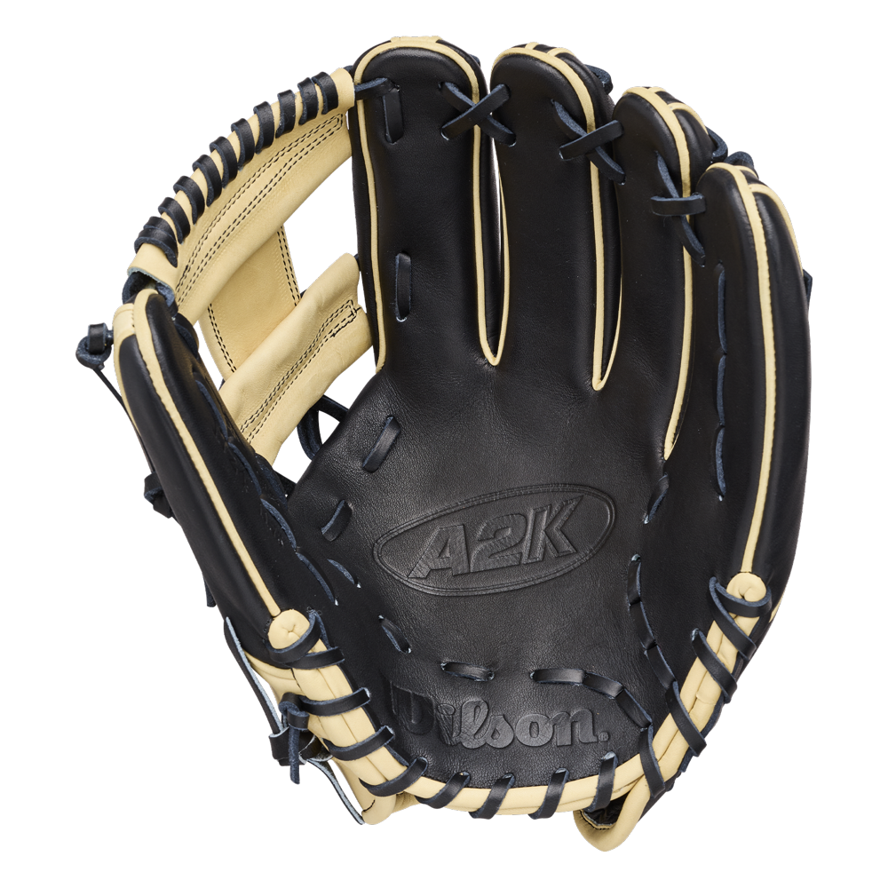 The Wilson A2K 1724 11.75″ Baseball Glove (WBG07701RT1175) by Wilson is pictured open on a plain white background, showcasing its black and tan colorway, visible stitching, Double Palm Construction, and detailed lacing—making it an ideal infielder’s glove for serious players.