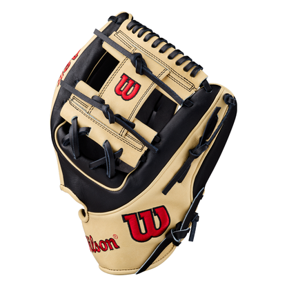 The Wilson A2K 1724 11.75″ Baseball Glove (WBG07701RT1175) by Wilson is displayed against a white background, featuring a tan and black design with red Wilson logos, black lacing, Double Palm Construction, and a deep pocket tailored for infielders.