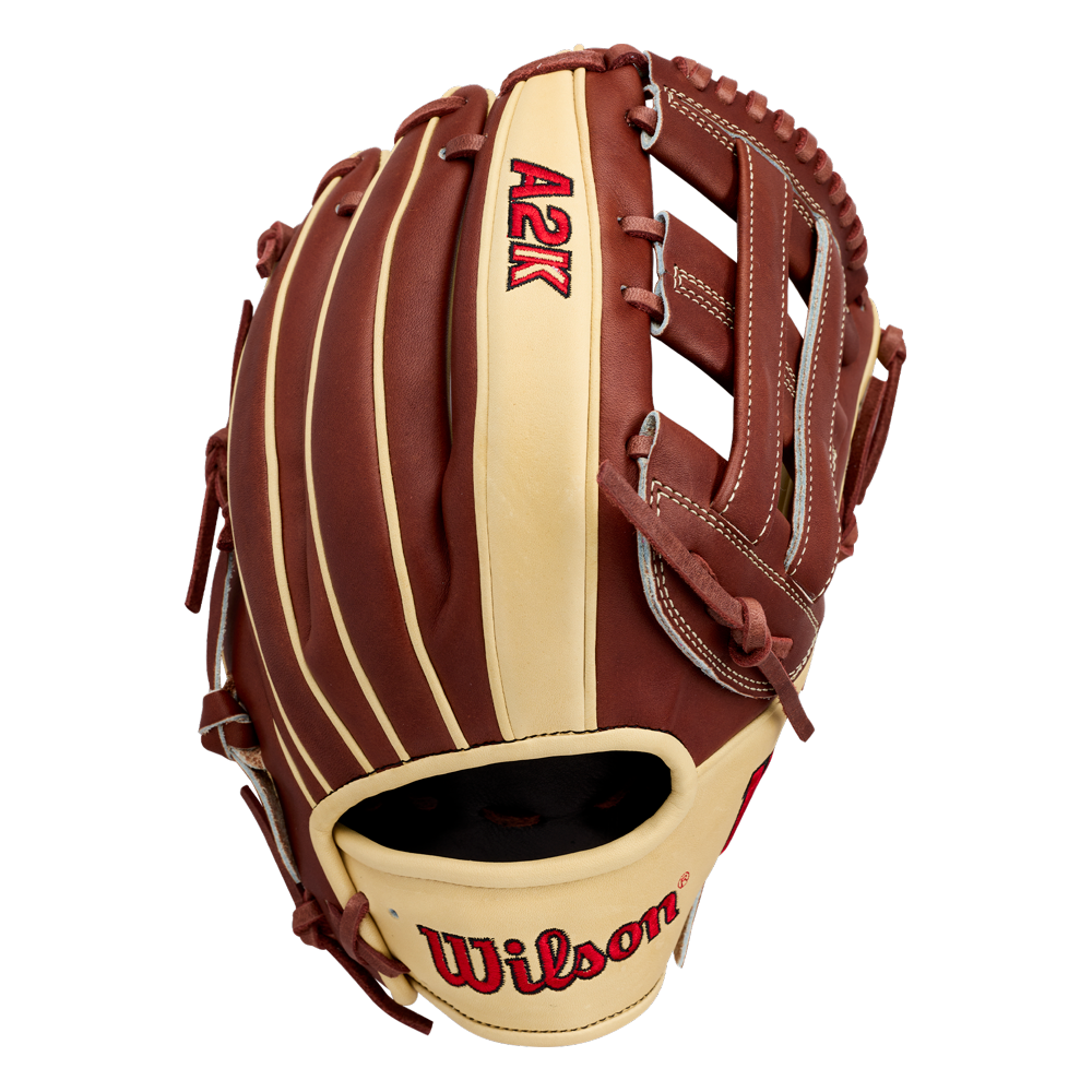 The Wilson A2K DW5 12″ Baseball Glove (WBG07801RT12) by Wilson is displayed upright, highlighting its brown and cream Pro Stock Select leather construction with red stitching, while showcasing its pocket, laces, and brand name.