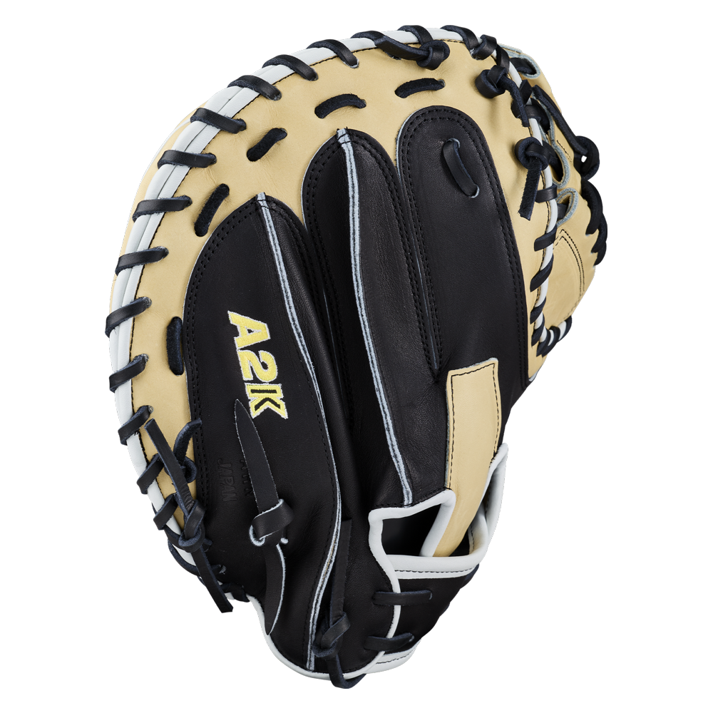 Introducing the Wilson A2K 1734 34″ Baseball Catcher’s Mitt (WBG10701RT34) by Wilson, a black and tan catcher’s mitt featuring “A2K” on the back and highlighted by white stitching and lacing along the edges. Expertly crafted with Double Palm Construction, this premium glove delivers outstanding stability and durability behind the plate.