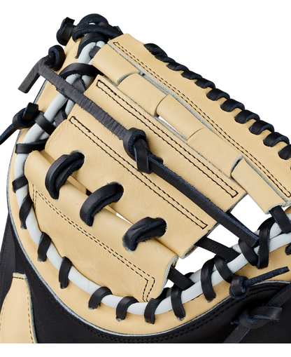 Close-up of the Wilson A2K 1734 34″ Baseball Catcher’s Mitt (WBG10701RT34) by Wilson, focusing on the intricate lacing and stitching around the webbing and pocket area, and highlighting its Double Palm Construction for enhanced durability.