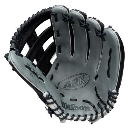 A Wilson A2K 1810 12.75″ Baseball Glove (WBG10802RT1275) in gray and black, crafted from Pro Stock Select leather with visible stitching and open webbing, is positioned to display the pocket and inside palm area.