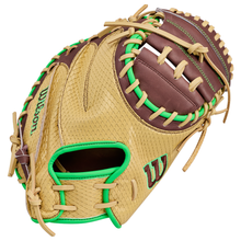 A Wilson A1000 CM33 DUBAI 33″ Baseball Catcher’s Mitt (WBG25101RT33) in tan and brown, featuring green stitching and accents, with an open pocket and detailed lacing.