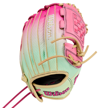 Introducing the Wilson A1000 P12 SUNSET 12″ Fastpitch Glove (WBG25201RT12) by Wilson, featuring a stylish pink, cream, and light green gradient design with tan laces. The glove displays the Wilson logo embroidered in pink and white on the thumb and wrist areas. Designed for serious players, this 12” fastpitch glove combines eye-catching style with high performance.