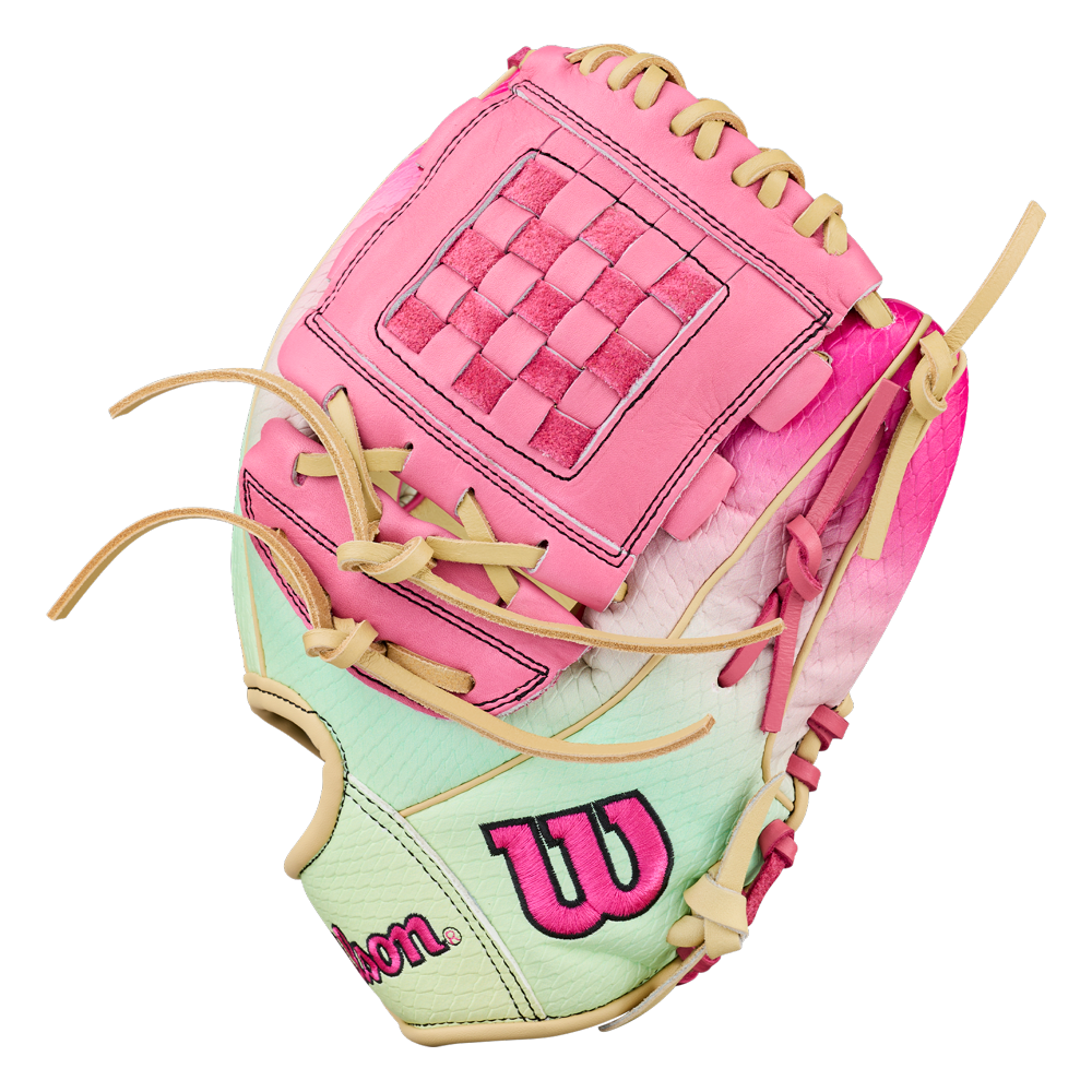 A Wilson A1000 P12 SUNSET 12″ Fastpitch Glove (WBG25201RT12) in pastel pink, mint green, and cream with a woven pocket and tan laces is displayed against a white background.