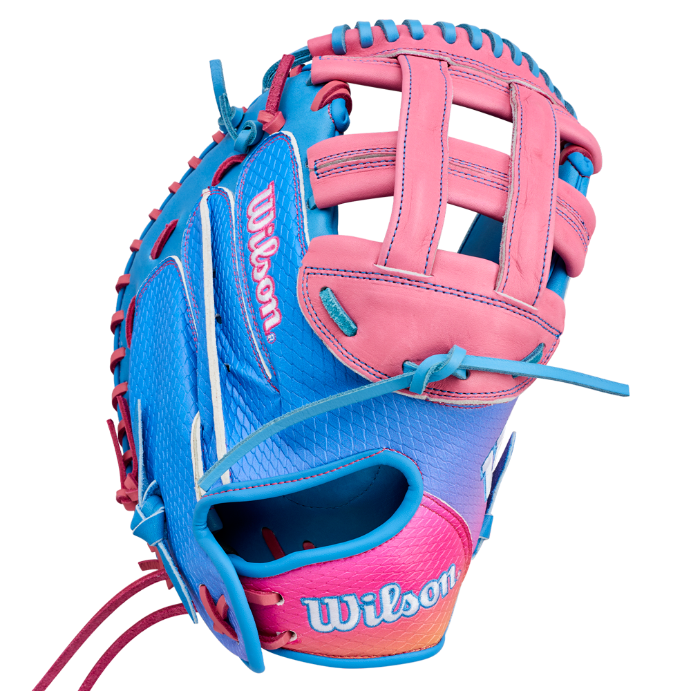 Certainly! Here is the rewritten sentence using the given product data: The Wilson A1000 FPCM33 MOMENTUM 33″ Fastpitch Catcher’s Mitt (WBG25301RT33) features pink and blue accents, a checkered lacing pattern, open webbing, and prominent Wilson branding on the wrist and thumb. Expertly crafted from durable Full Grain leather with a 33” circumference, it ensures a superior fit for fastpitch catchers.