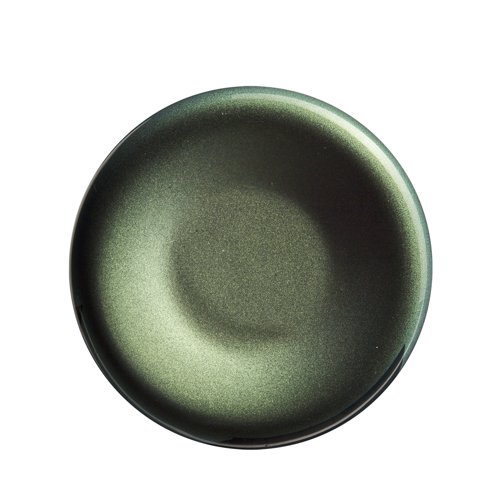 A round, metallic green ceramic plate with a glossy finish, seen from above, echoes the composite design of the 2023 Louisville Slugger Meta (-13) USA T-Ball Baseball Bat (WBL2667010), set against a plain white background.