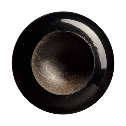 A black, round, hollow object with a shiny outer edge and a matte, textured inner surface, viewed from above against a white background—evoking the smooth finish of the Louisville Slugger Maple S345 Fungo 35″ Wood Training Bat (WBL270801035) used in coach training.
