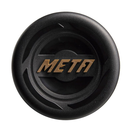 A black circular object featuring “META” in stylized gold letters, inspired by the Louisville Slugger Meta LTD (-8) USSSA Baseball Bat (WBL2822010), is displayed against a plain white background.