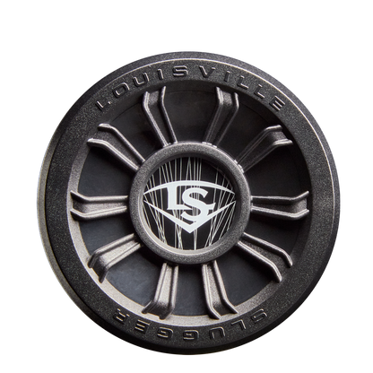 A close-up of the 2026 Louisville Slugger Select PWR (-5) USA Baseball Bat end cap shows a black and silver spoke-like design with LOUISVILLE SLUGGER and the LS logo in the center.
