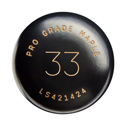 A black circular bat knob from Louisville Slugger, featuring gold text that reads PRO GRADE MAPLE, the number 33 in the center, and LS421424 at the bottom. This knob belongs to the Louisville Slugger Players Cut Maple Wood Baseball Bat (WBL4158010), crafted with Players Cut Maple and finished with an EXOPRO-Ppr Hardcoat for enhanced durability.