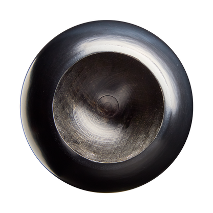 A close-up, top-down view of a black, shiny, circular detail with a slightly recessed center and reflective surface on a plain white background, showcasing the refined finish characteristic of the Louisville Slugger Players Cut Maple Wood Baseball Bat: WBL4158010 by Louisville Slugger.